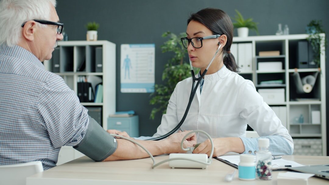 elderly person with doctor